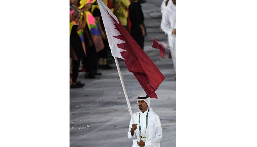 Qatar\'s flagbearer Sheikh Ali Khalid al-Thani leads the delegation

