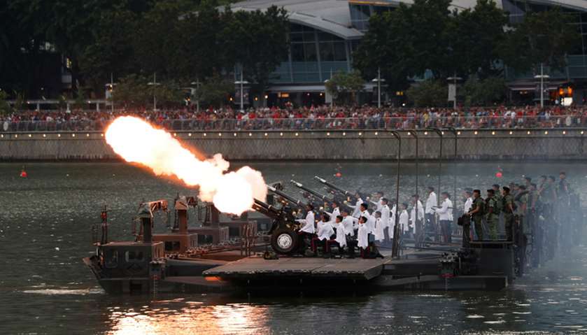 A 21-gun salute is fired during Singapore\'s 52nd National Day celebrations