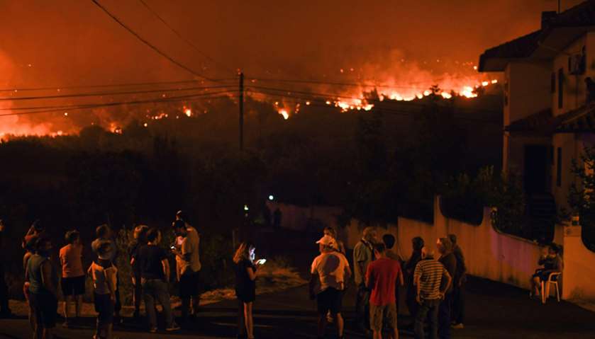 Forest fires ahead of a weekend of warm temperatures, at Rio de Moinhos village in Abrantes
