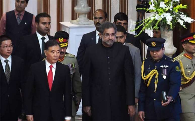 Chinese Vice Premier Wang Yang is seen with Pakistan\'s Interim Prime Minister Shahid Khaqan Abbasi