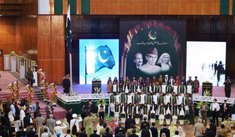 President Mamnoon Hussain stands while listening to the national anthem on Monday