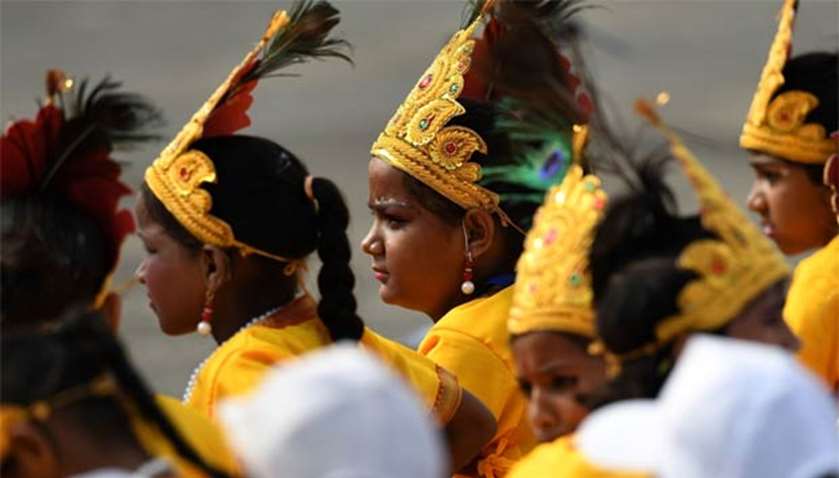 Children dressed as Lord Krishna participate in the Independence Day celebrations in New Delhi