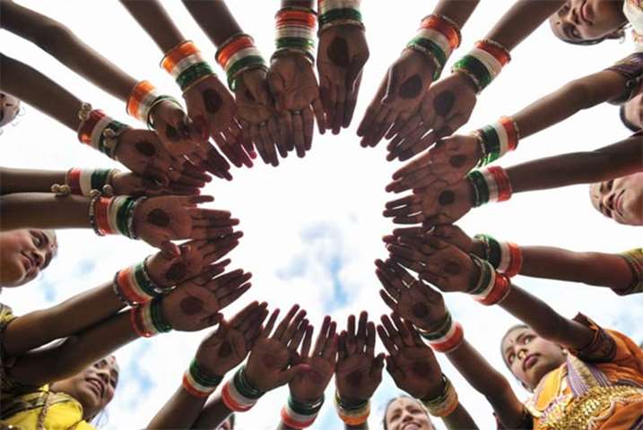 Indian girls wear tri colour bangles during Independence Day celebrations in Secunderabad