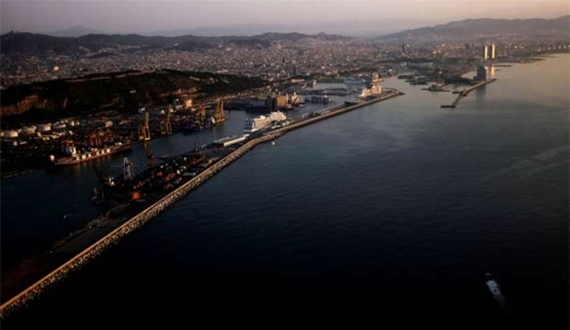 The coast of Barcelona is seen at sunrise the morning after a vehicle attack on Las Ramblas street