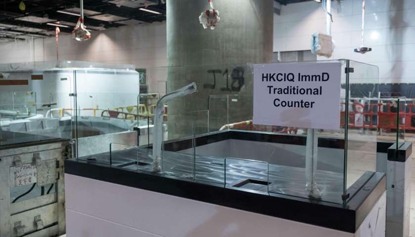 A counter for the Hong Kong immigration channels is seen under construction at the West Kowloon Term