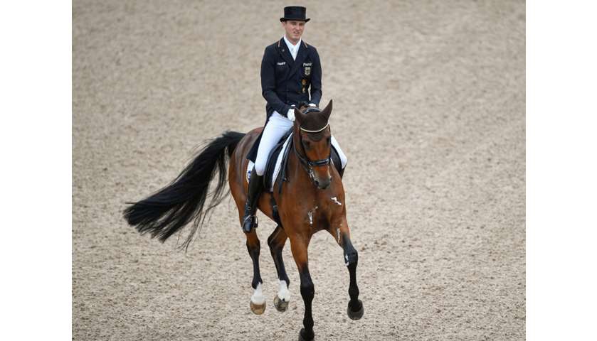 Sonke Rothenberger of Germany competes on his horse Cosmo 59.