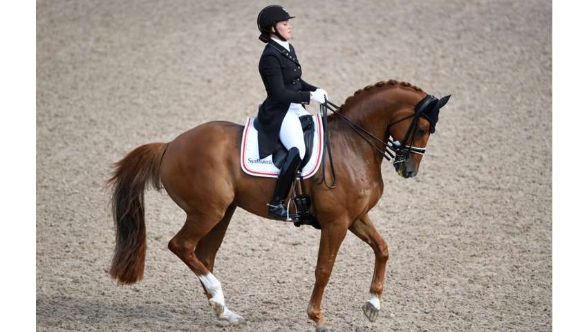 Cathrine Dufour of Denmark competes on her horse Atterupgaards Cassidy
