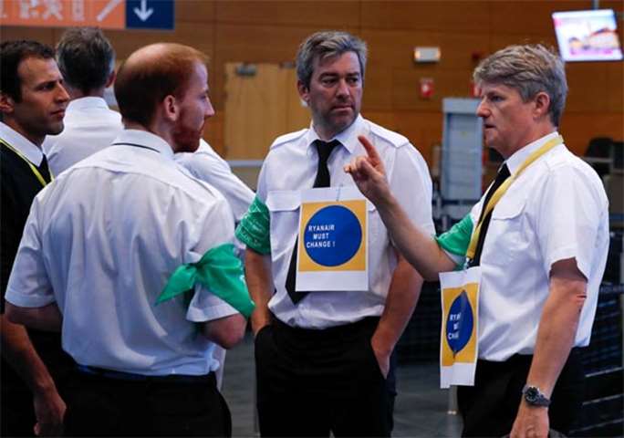 Belgian Ryanair pilots take part in a protest at Brussels South Charleroi Airport on Friday
