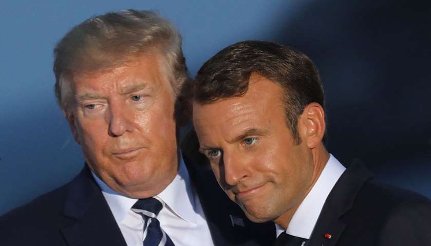 US President Donald Trump (L) and France\'s President Emmanuel Macron