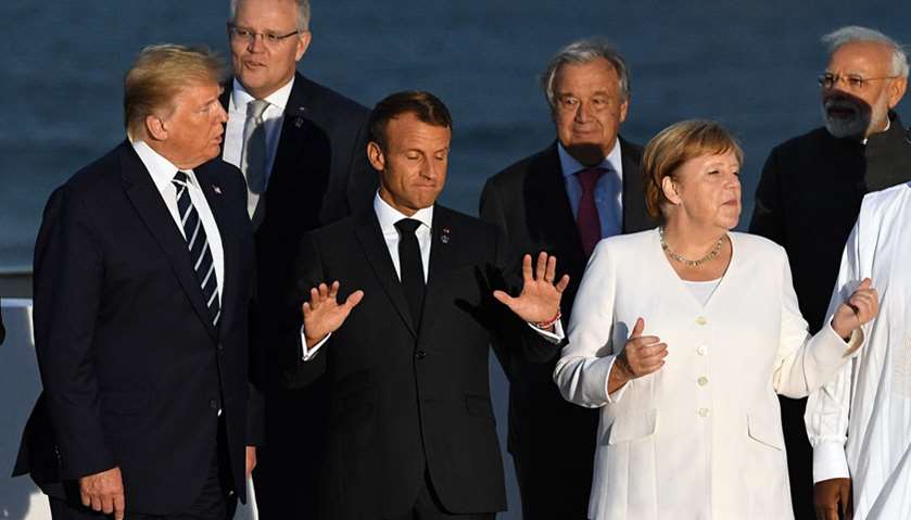 U.S. President Donald Trump, French President Emmanuel Macron and German Chancellor Angela Merkel