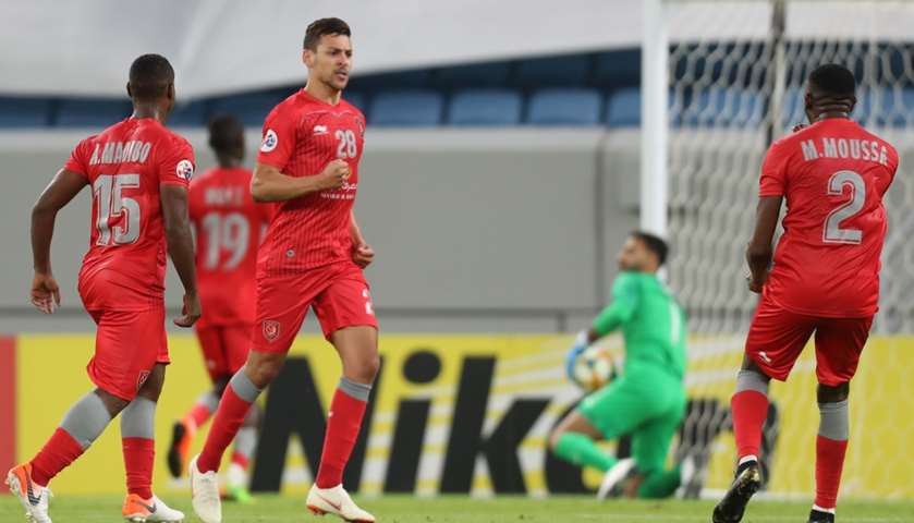 Duhail\'s midfielder Youssef Msakni (C) celebrates his equalising goal