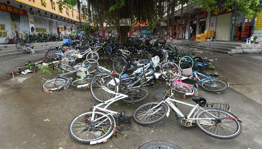 Toppled bicycles lie on street after Typhoon Meranti makes a landfall