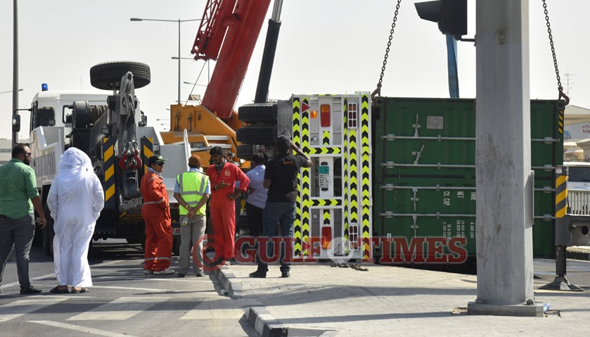 The trailer was turning into Rawdat Al Khail Road when it overturned