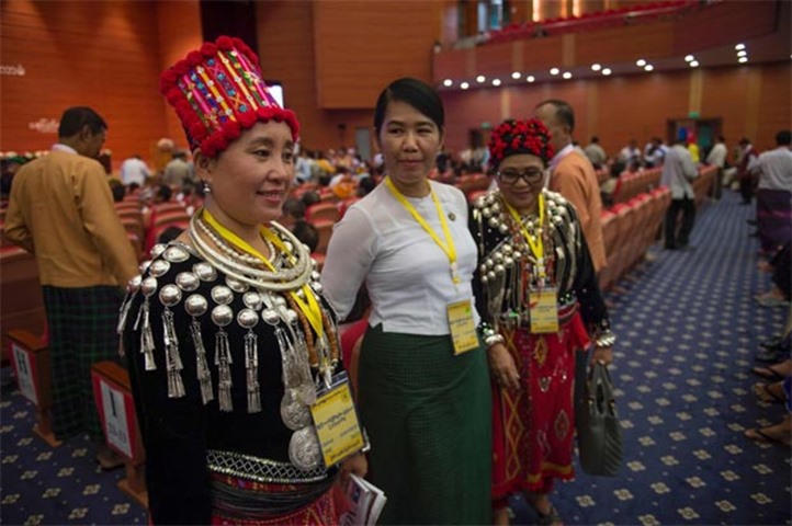 Peace conference delegates from Kachin ethnic group wear their traditional costumes