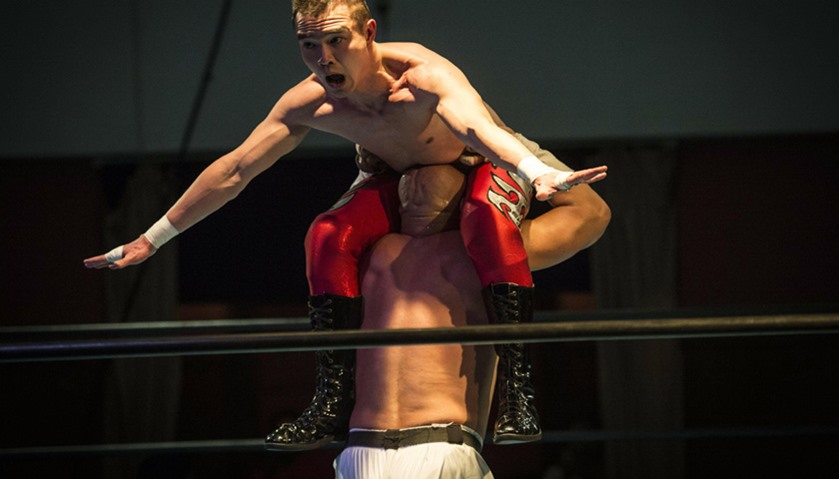 Singaporean wrestler Greg Glorious in the air at an event