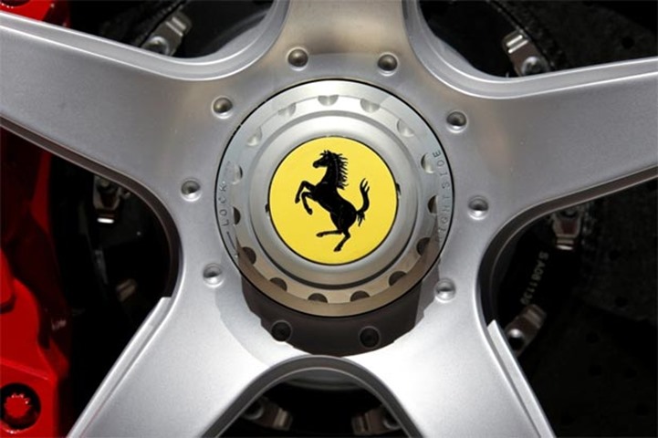 A Ferrari logo is seen on media day at the Paris auto show