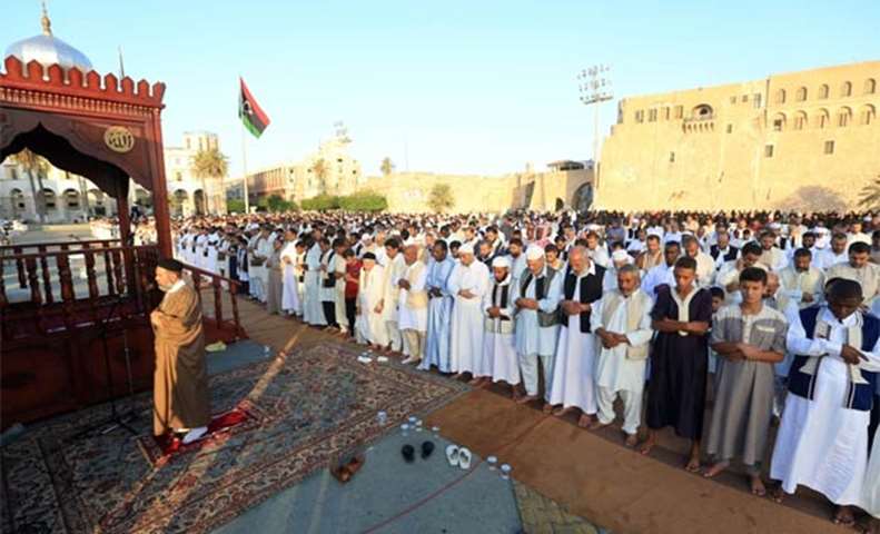 Libyans pray in Martyrs\' Square in the capital Tripoli on Friday