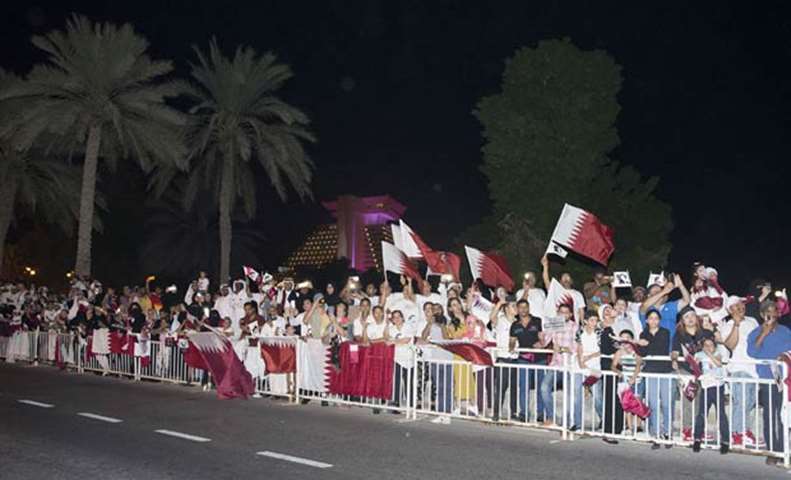 Thousands of people lined up along the Corniche to greet His Highness the Emir