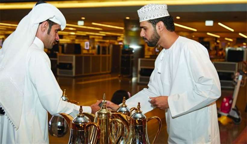 A visitor from Oman is being greeted with Arabic coffee at HIA