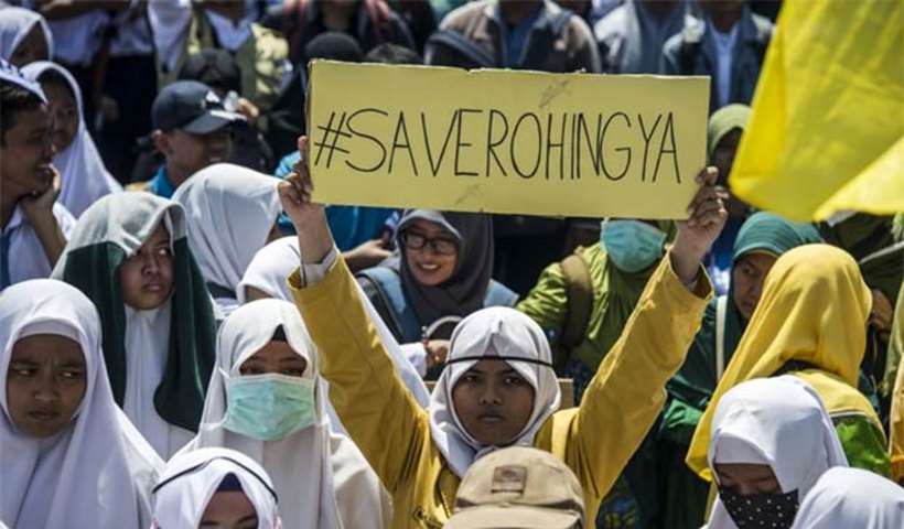 Indonesian activists protest against Myanmar in Surabaya on Tuesday