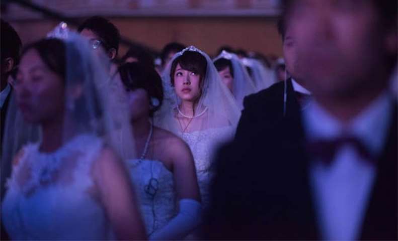 A bride attends a mass wedding ceremony held by the Unification Church in Gapyeong