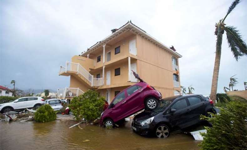 Cars piled on top of one another in Marigot, near the Bay of Nettle, on the island of Saint Martin