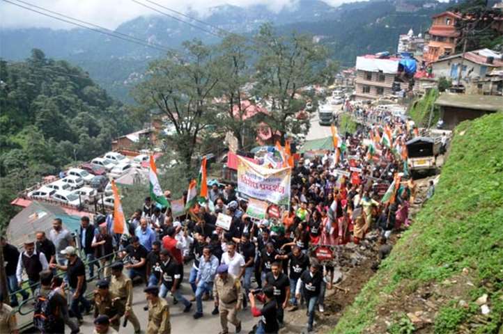 Congress party activists shout slogans during a \'Bharat Bandh\' in the northern hill town of Shimla