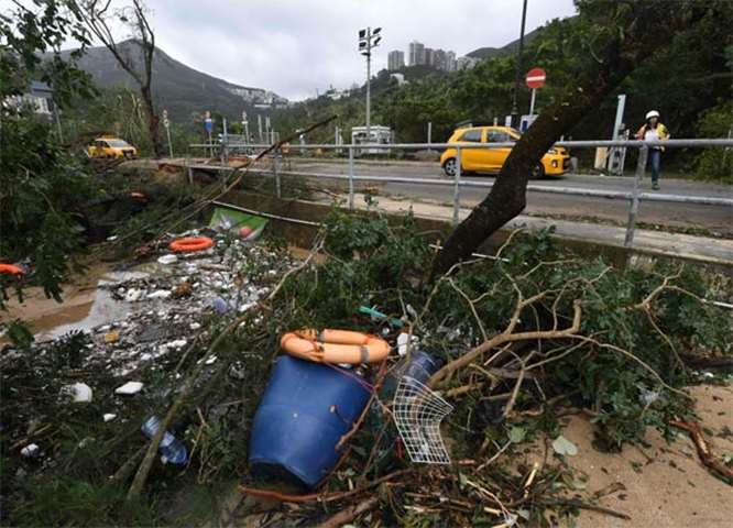 Deep Water Bay in Hong Kong is littered with debris following the typhoon