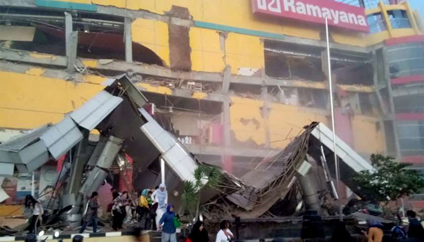 A shopping center heavily damaged following an earthquake in Palu, Central Sulawesi