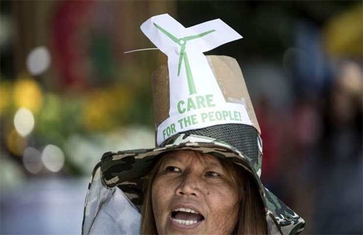 A protester makes a point during a march in Manila on Saturday