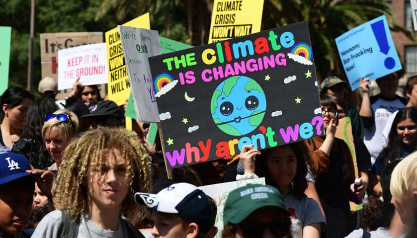 Thousands of youth demand action during a Climate Change protest in downtown Los Angeles, California