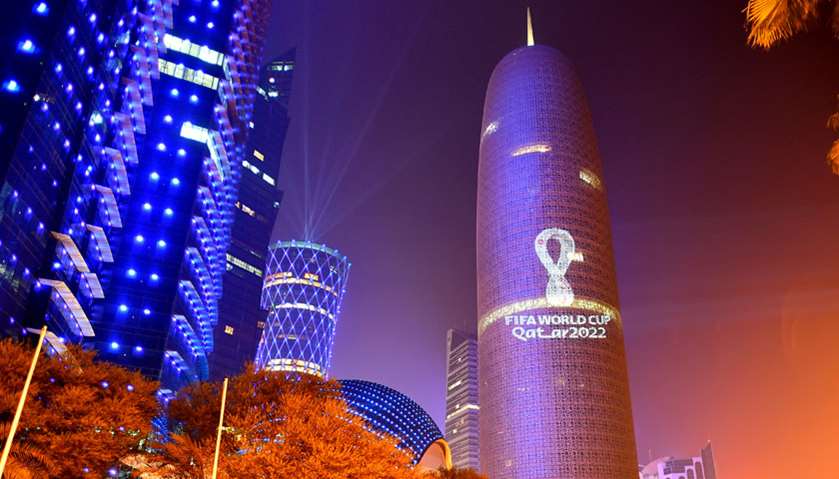 The tournament\'s official logo for the 2022 Qatar World Cup is seen on the Doha Tower in Doha