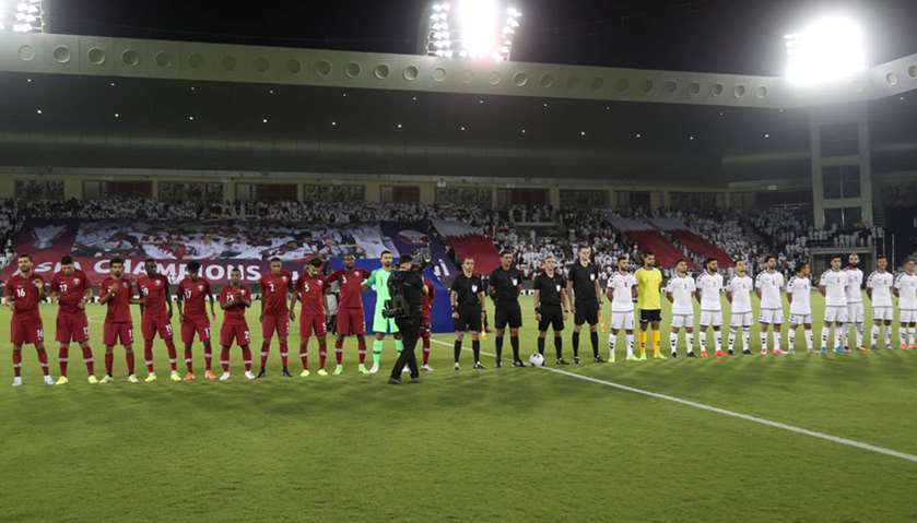 Afghanistan and Qatar players line up before the match