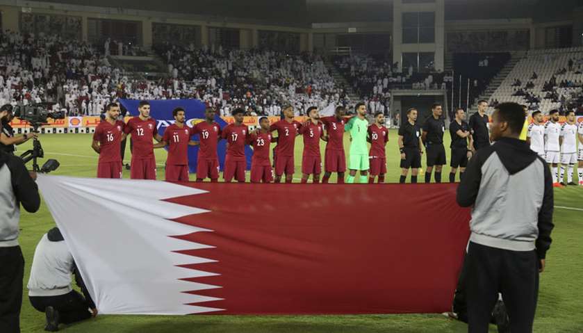 Qatar players line up before the match