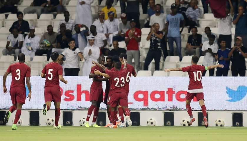 Qatar\'s Ali Almoez celebrates scoring their second goal with team mates