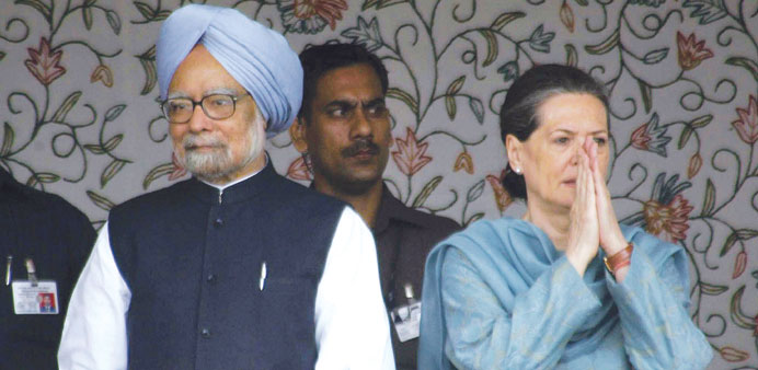 Prime Minister Manmohan Singh looks on as Congress Party president Sonia Gandhi gestures during the foundation stone lying ceremony of hydro-power pro