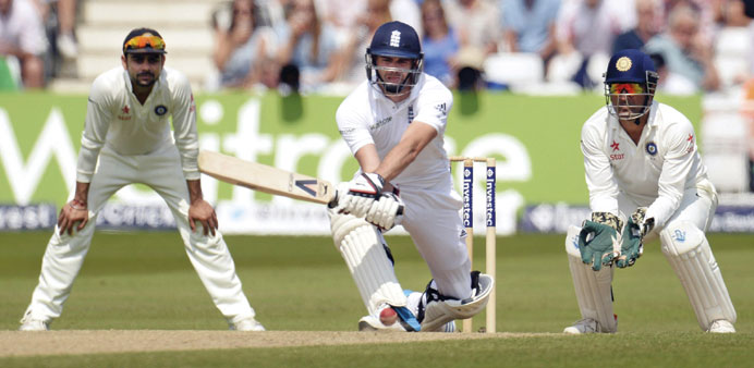 Englandu2019s James Anderson prepares to play a reverse sweep during the third dayu2019s play of the first Test against India, at Trent Bridge ground in Notti