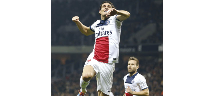 Paris Saint Germainu2019s Edinson Cavani celebrates after scoring against Nice during their French Ligue 1 match on Friday. (Reuters)