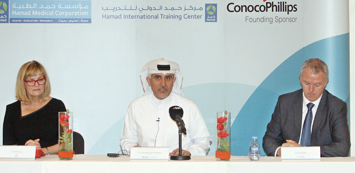    Dr Saifeldeen flanked by Carr (left) and Sykes is seen speaking at the press conference.