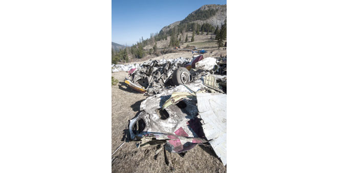 A picture taken and released on Monday by the French interior ministry shows wreckage and bags of debris collected from the crash site of the German A