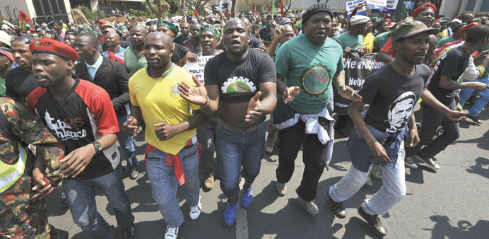 Miners from Marikana, their families and supporters march to the Union Buildings in Pretoria yesterday.