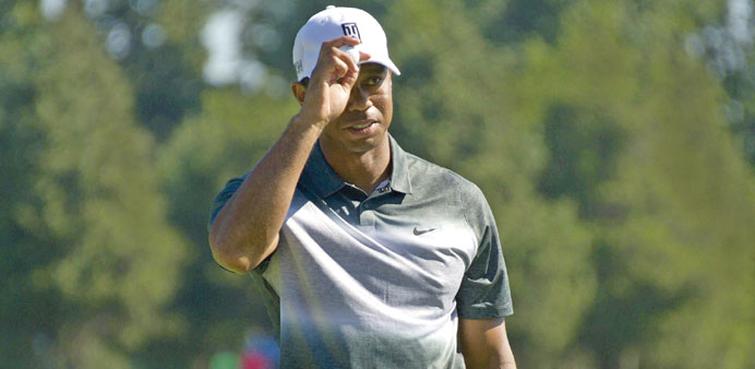 Woods acknowledges supporters during the second round of the PGA Quicken Loans National on Friday.