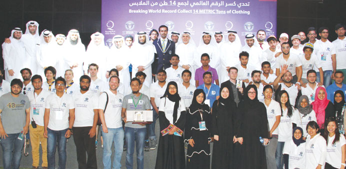 Officials and participants in a group photo