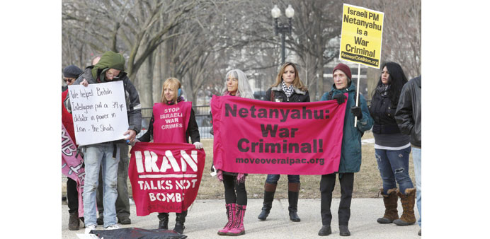  People demonstrating against Israeli Prime Minister Benjamin Netanyahu on Capitol Hill in Washington yesterday. 