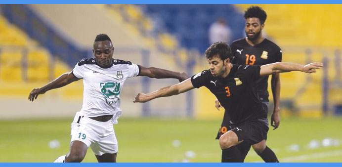 Umm Salal defender Rami Fayez (right) in action during a QSL match.