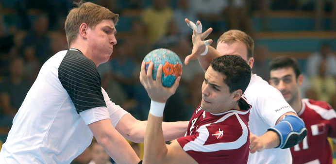  Action from the  IHF Junior World Championship match between Qatar and Germany yesterday.