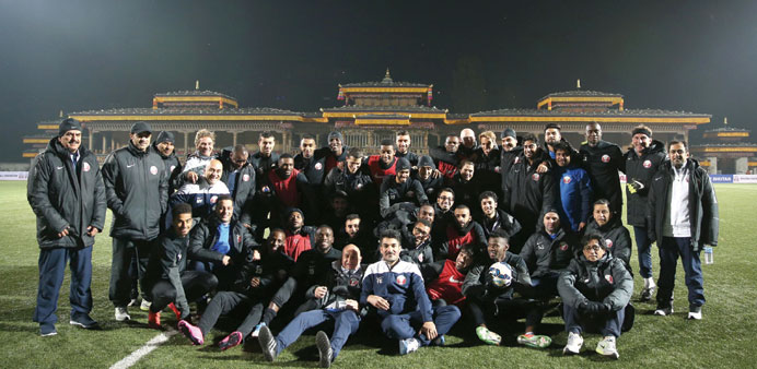 The Qatar football delegation pose ahead of the  teamu2019s match  against Bhutan in Thimphu.