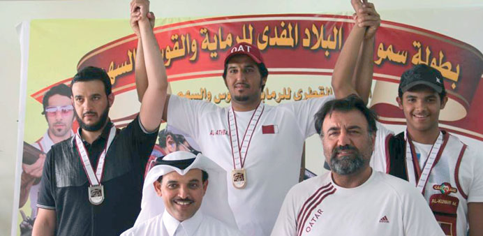 Winners of the HH The Emir Shooting Championships pose with their medals.