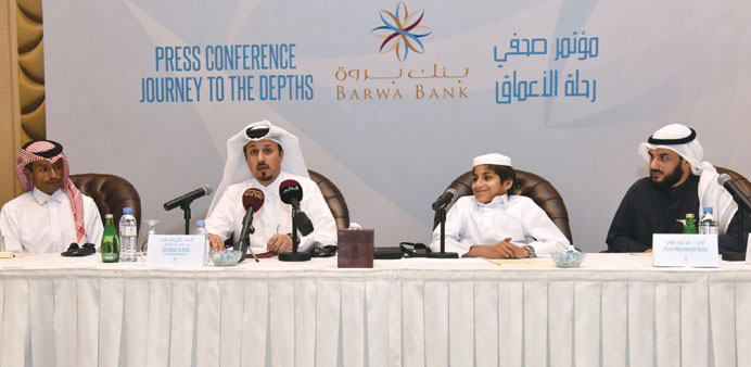 Barwa Bank officials and al-Muftah (second right) speak about the documentary yesterday. 