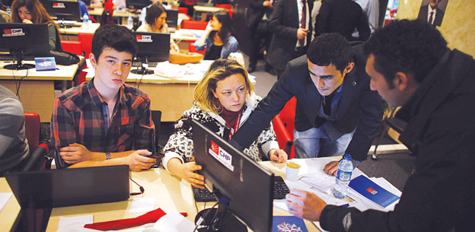 Volunteers work on the verification of election results at the main opposition Republican Peopleu2019s Party (CHP) headquarters in Ankara.